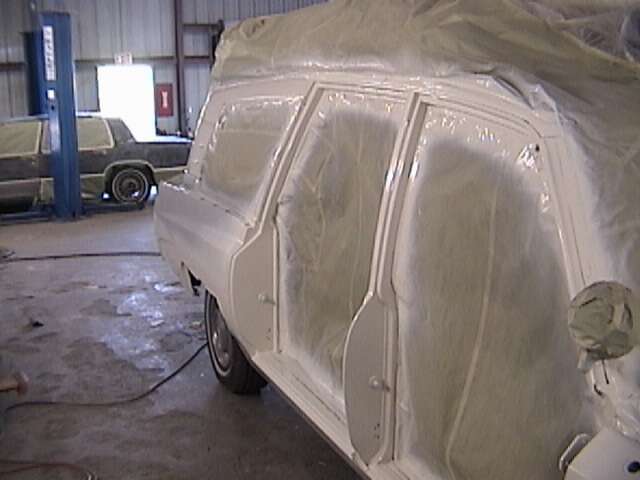 This car's restoration took several months. The doors had to be removed to replace metal.