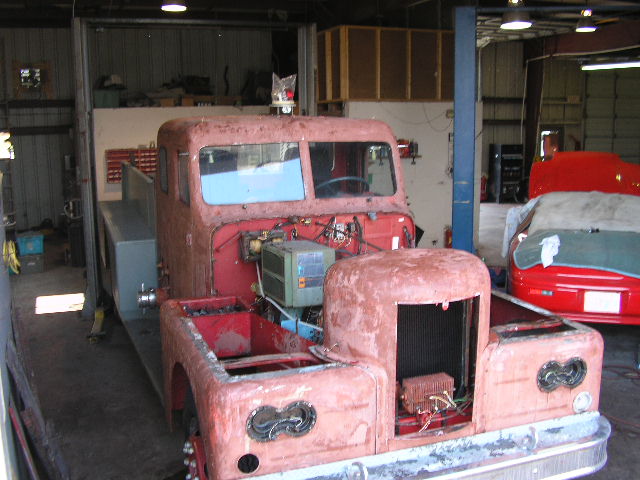As you will read, this truck became a very special vehicle in the history of fire fighting apparatus, and its builder, Peter Pirsch & Sons, Kenosha, WI.  Here it's being sanded down; fender tops (diamond plate) and hood removed.