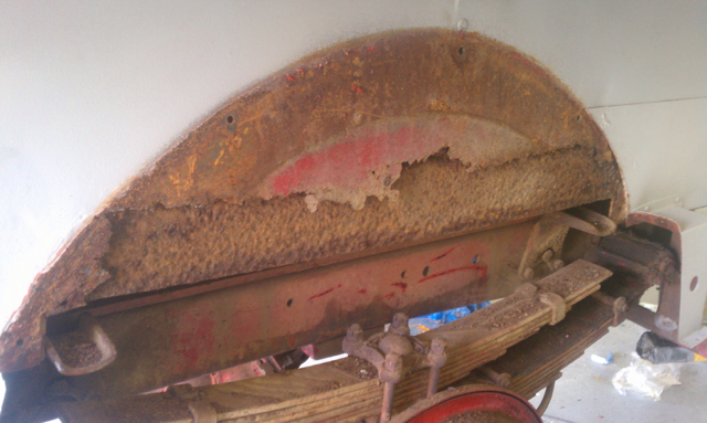 Rust behind the rear fenders- metal replaced.