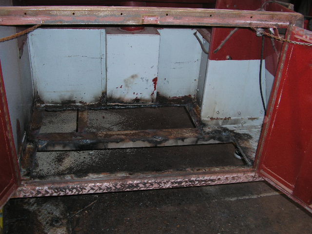 The floor in this compartment (among others) was rusty and was cut out.